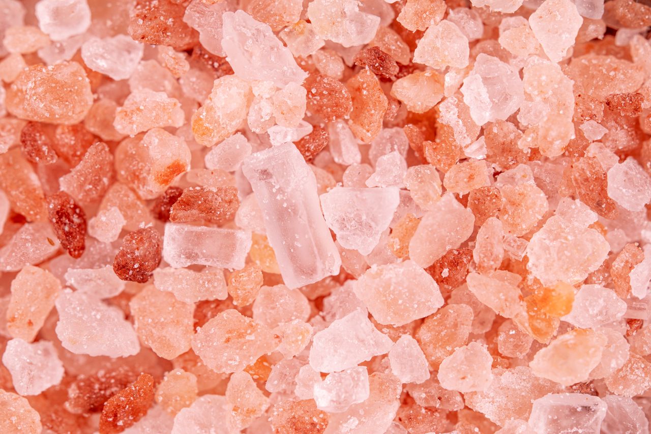 Mastering the First Impression: Your intriguing post title goes here Macro image showcasing the detailed texture and color of pink Himalayan salt crystals.